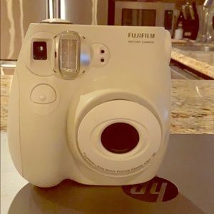 White Polaroid camera